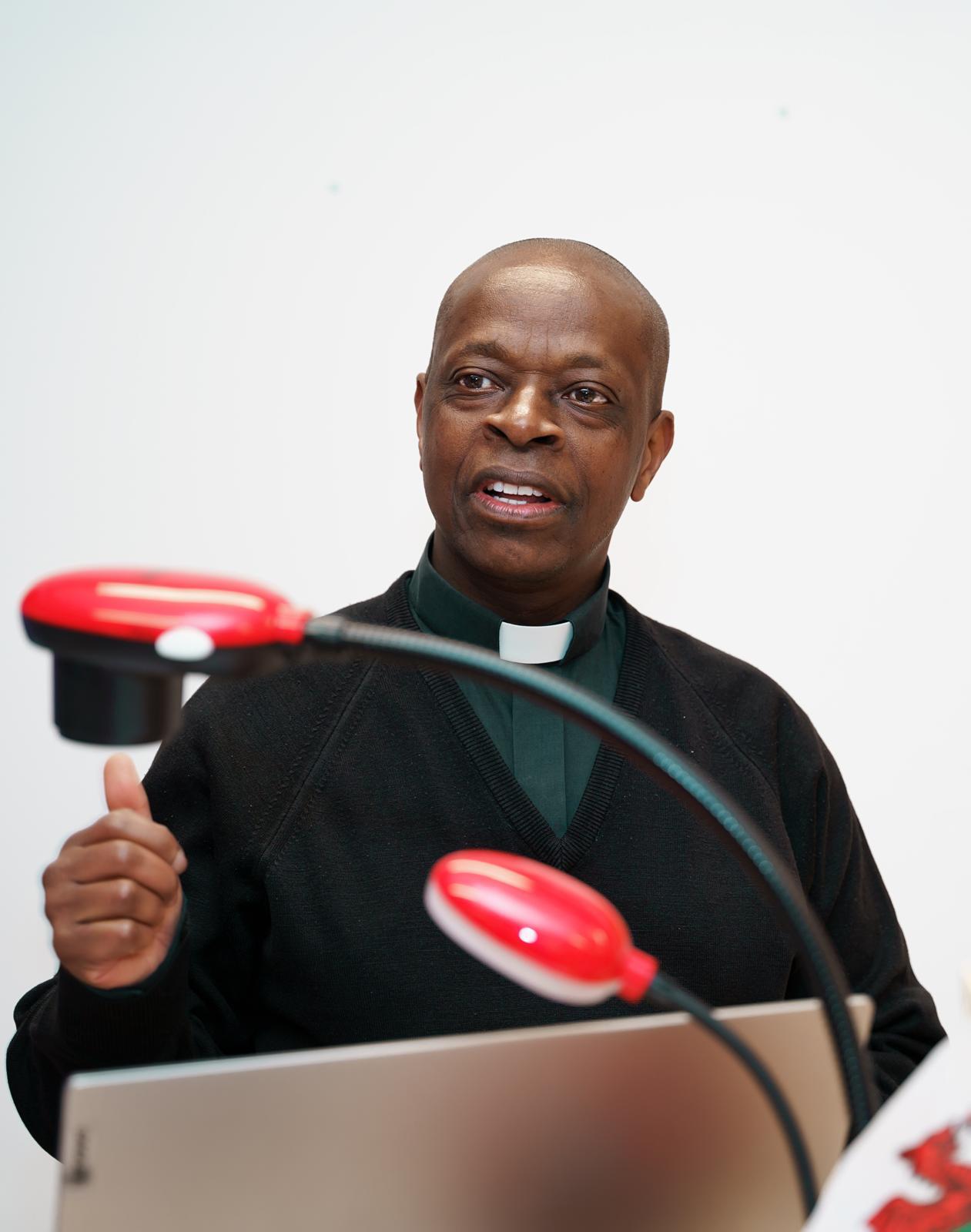 A community leader speaking at a UCANI event