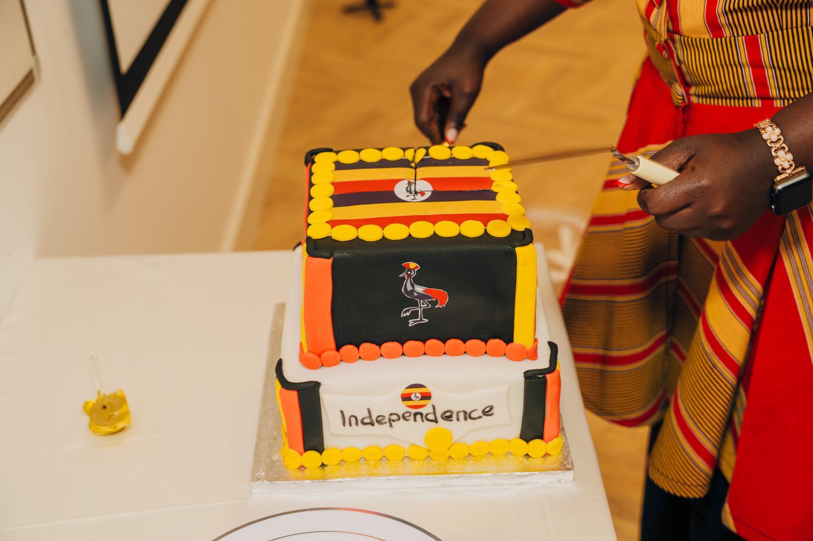 A Uganda independence cake being cut