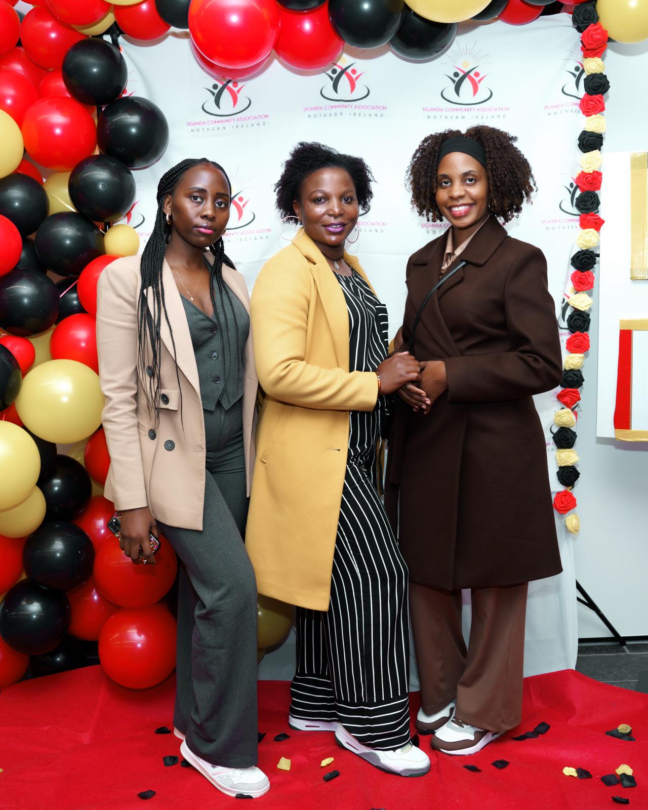 Members posing at a UCANI branded photo wall
