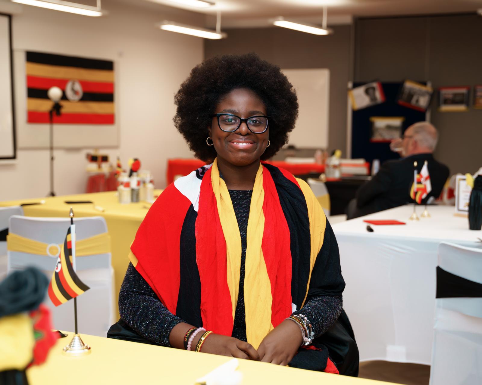 A young member wearing Uganda colours